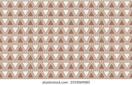 Geometric Mocha mousse background. Seamless brown color pattern from triangles. Merry Christmas trendy colour backdrop.