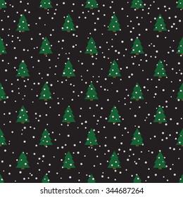 Geometric monochrome seamless pattern with green Christmas tree and snow for brown winter holidays design. 