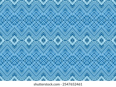 Geometric native fabric patterns with a blue hue can be connected in every direction.