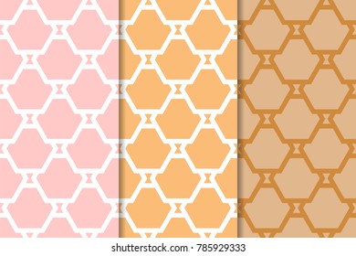 Geometric ornamental patterns. Set of orange seamless backgrounds