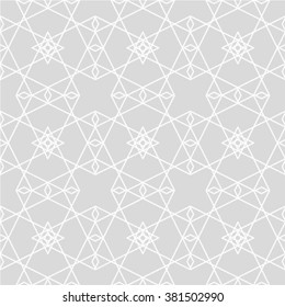 The geometric pattern by stripes, lines, rhombuses. Seamless vector background. Gray and white texture