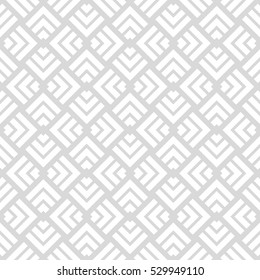 The geometric pattern by stripes, lines, rhombuses.Seamless vector background. Gray and white texture