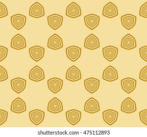 geometric pattern of circles and ovals. Seamless vector illustration. for the design, printing, presentations, wallpapers. gold color