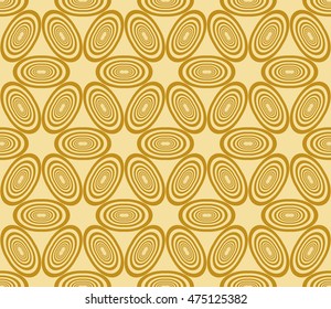 geometric pattern of circles and ovals. Seamless vector illustration. for the design, printing, presentations, wallpapers. gold color