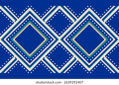 Geometric pattern design of cream, green, yellow on blue background. Abstract seamless vector in chevron shape. Concept of pixel arts, ethnic, motifs, design for batik, clothing, texture, embroidery.