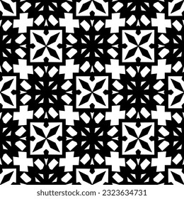 Geometric pattern in ethnic style. Seamless background  with  abstract shapes. Black and white wallpaper. Abstract background  with Repeating pattern for decor, textile and fabric.