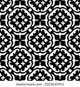 Geometric pattern in ethnic style. Seamless background  with  abstract shapes. Black and white wallpaper. Abstract background  with Repeating pattern for decor, textile and fabric.