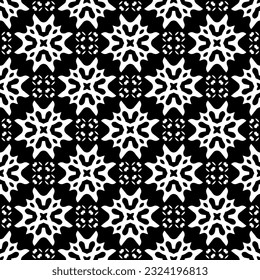 Geometric pattern in ethnic style. Seamless background  with  abstract shapes. Black and white wallpaper. Abstract background  with Repeating pattern for decor, textile and fabric.