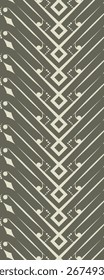 A geometric pattern featuring lines and shapes in a repeating design.