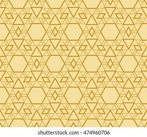 geometric pattern of hexagons. Seamless vector illustration. for the design, printing, presentations, wallpapers. gold color