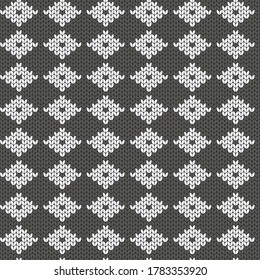 Geometric pattern. Imitation knitting or embroidery. Seamless background. Jacquard.