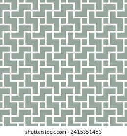 Geometric pattern with stripes. Seamless background. Green and white. Rhythmic structure of herringbone.