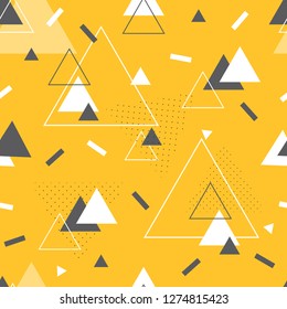 Geometric pattern. Triangles on a yellow background. Seamless background.