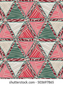 Geometric pattern with triangles. Triangles red green striped on texture.Hand drawn with ink seamless background.Creative handmade repainting design for fabric or textile.Vintage retro colors
