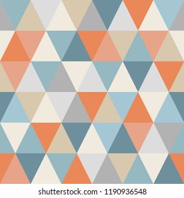 Geometric pattern of triangles. Seamless. Warm and cold colors. Triangles are chaotically colored. Abstract background