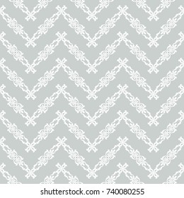 Geometric patterns formed from squares.Template for embroidery, decoration cards, wrappers, business cards, gift tags, labels, and textile elements of interior design.Vector seamless illustration.