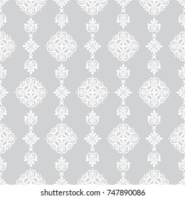 Geometric patterns formed from squares.Template for embroidery, decoration cards, wrappers, business cards, gift tags, labels, and textile elements of interior design.Vector seamless illustration.