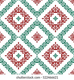 Geometric patterns formed from squares.Template for embroidery,Ceramic tiles and textile elements of interior design.Vector seamless illustration.Christmas set of red-green color on a white background