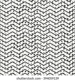 Geometric seamless abstract chevron zigzag stripes pattern. Hipster striped. Wrapping paper. Scrapbook. Vector illustration. Background. Graphic texture with randomly disposed spots. Pattern.