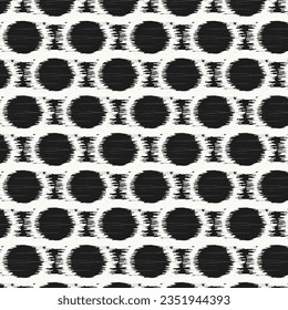 Geometric seamless dots print ethnic ikat style. Polka dots abstract vector background pattern. Ikat traditional weaving design for home decor, print, fabric, clothing, blanket, carpet, curtain.