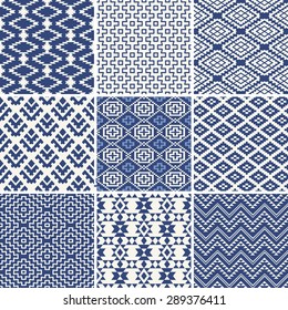 Geometric seamless ethnic background collection in blue and white