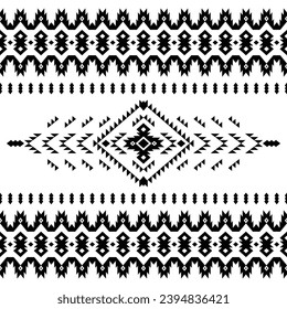 Geometric seamless ethnic pattern in black and white color. Aztec tribal contemporary motif. Native style. Design for curtain, textile, wrapping, fabric, clothes, patchwork, batik, texture, ikat.