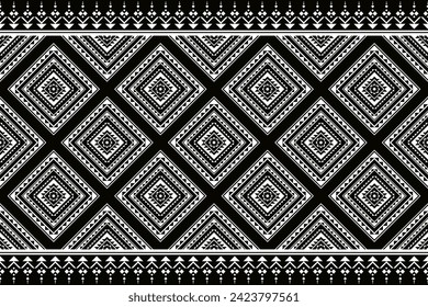Patrón étnico sin fisuras geométricas Color blanco y negro. El patrón geométrico étnico puede utilizarse en el diseño de tejidos para ropa, envoltura, textiles, bordado, alfombra, patrón tribal