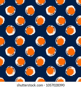 Geometric seamless pattern. Brightly orange and white circles on a dark background. Vector background.