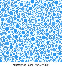 Geometric seamless pattern of circles. Blue circles on a white background. Vector illustration.