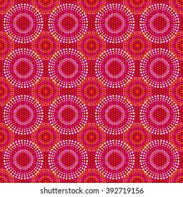 Geometric seamless pattern circles large and small in the red range, vector.