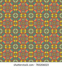 Geometric seamless pattern circular ornament. Vector multicolor mandalas in brown, yellow and blue colors. Perfect for any kind of design, wedding, birthday, holidays, kaleidoscope, medallion.