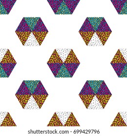 Geometric seamless pattern. Colorful beautiful elements: polygons, rhombuses, triangles, in the style of different scraps, the patchwork of tiles. The style of Memphis.