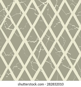 Geometric seamless pattern with cracked grey rhombuses.