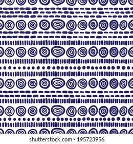 Geometric seamless pattern in ethnic style. Ornamental structure of circles and stripes. Vector.