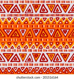 Geometric seamless pattern in ethnic style. Bright colorful shapes triangles, strips and zigzags. Vector. 