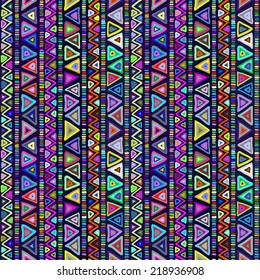 Geometric seamless pattern in ethnic style. Bright colorful shapes triangles, strips and zigzags on a dark background.