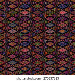 Geometric seamless pattern in ethnic style. Colorful structure of triangles, circles, and polygons. 