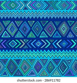 Geometric seamless pattern in ethnic style. Color graphics, diamonds, triangles, zigzags, stripes, painted by hand.
