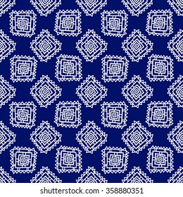 Geometric seamless pattern in ethnic style. Blue and white graphics, diamonds, triangles, painted by hand. or the design and decoration background, wallpaper, packaging, fabrics, textiles.