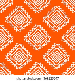 Geometric seamless pattern in ethnic style. The structure of classical folk motifs on a orange background.