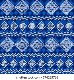 Geometric seamless pattern in ethnic style. Blue and white graphics, vector, drawn by hand.