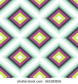 Geometric seamless pattern. Green, mint and purple rhombus vector pattern.