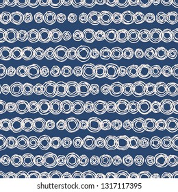 Geometric seamless pattern with hand drawn circles. Indigo background in sketchy minimal style. EPS10