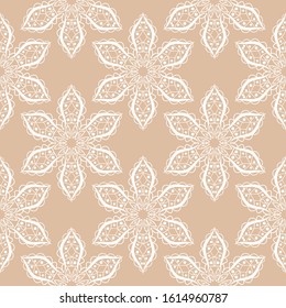 Geometric seamless pattern in indian style. White design on beige background. Vector illustration