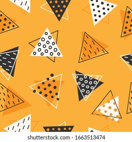 Geometric seamless pattern made of triangles. Decorated with circles and lines. Hand-drawn background. Modern design.
