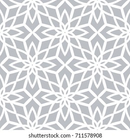 Geometric seamless pattern. Modern floral ornament. Gray and white color. Vector illustration. For the interior design, wallpaper, decoration print, fill pages