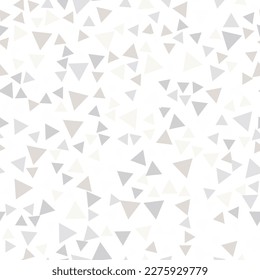 Geometric seamless pattern of pale small gray and beige triangles for textile, paper and other surfaces
