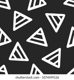 Geometric seamless pattern with repeating triangles. Drawn by hand, sketch, doodle. Endless trendy print. Modern vector illustration.