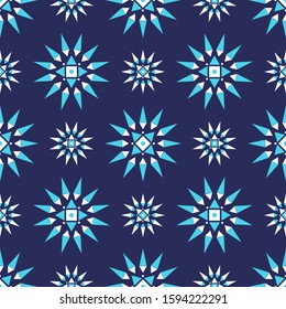 Geometric seamless pattern of triangular stars and round shapes on dark blue. Vector repeating symmetrical background with blue and white elements for cover, textile, print, wrapping, fashion design. 