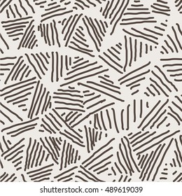 Geometric seamless pattern. The pattern of uneven hand-drawn lines of different lengths. Simple regular background. Vector illustration